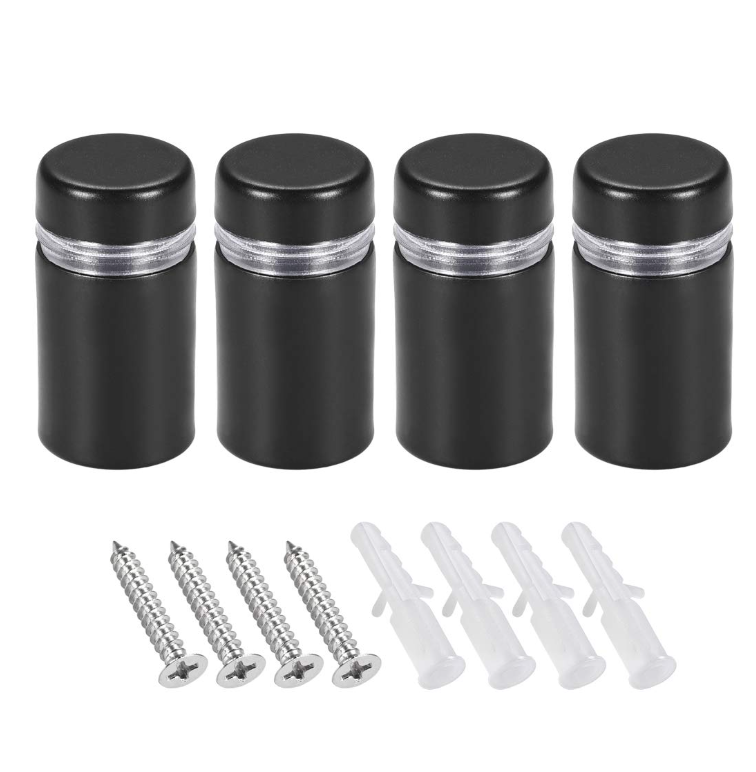 Stainless steel standoffs mounted on exterior wall, creating a floating effect for an acrylic sign with clean and modern finish.