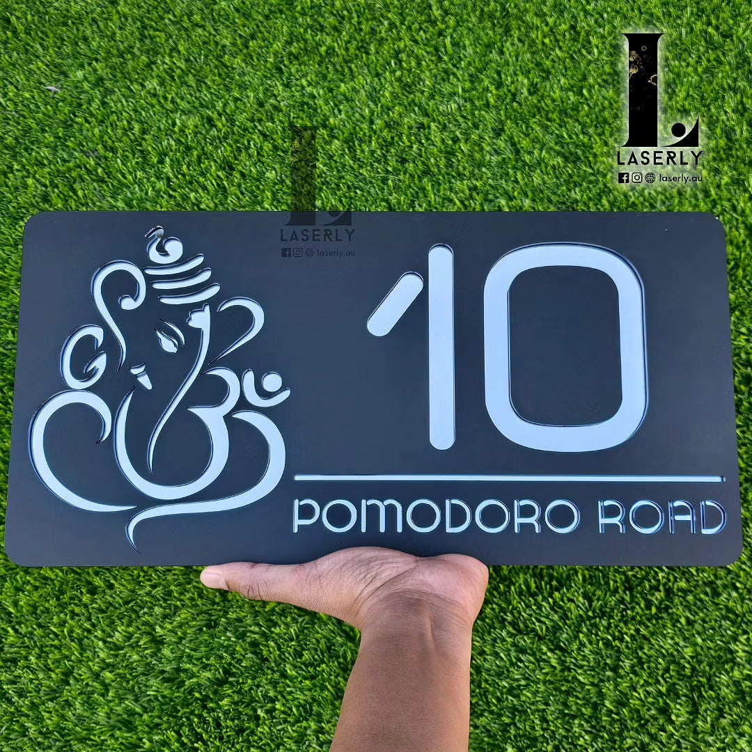 Modern Ganesha house number plaque in black and silver acrylic.