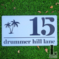 Personalized palm-themed acrylic house number sign for exterior walls.