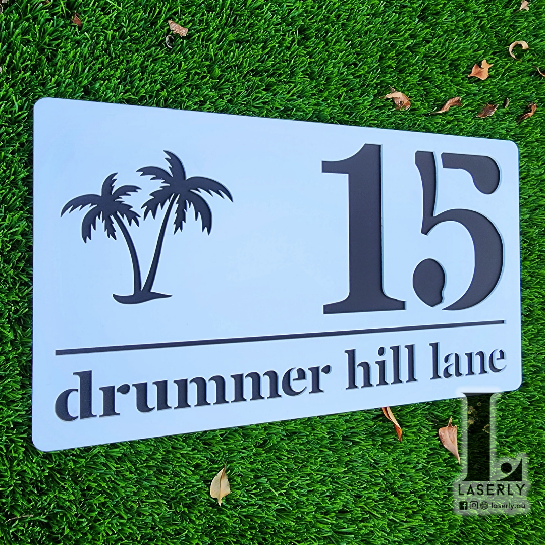 Minimalist palm tree acrylic house number sign, ideal for modern homes.