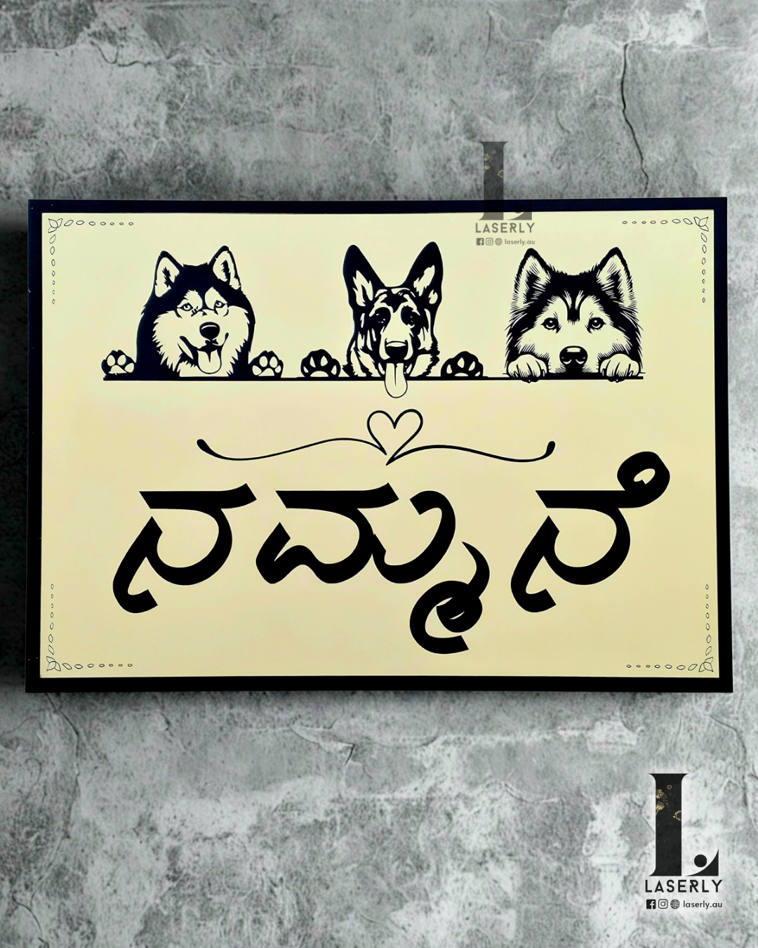 Personalised dog-themed house name sign featuring custom family name and decorative dog silhouette design.