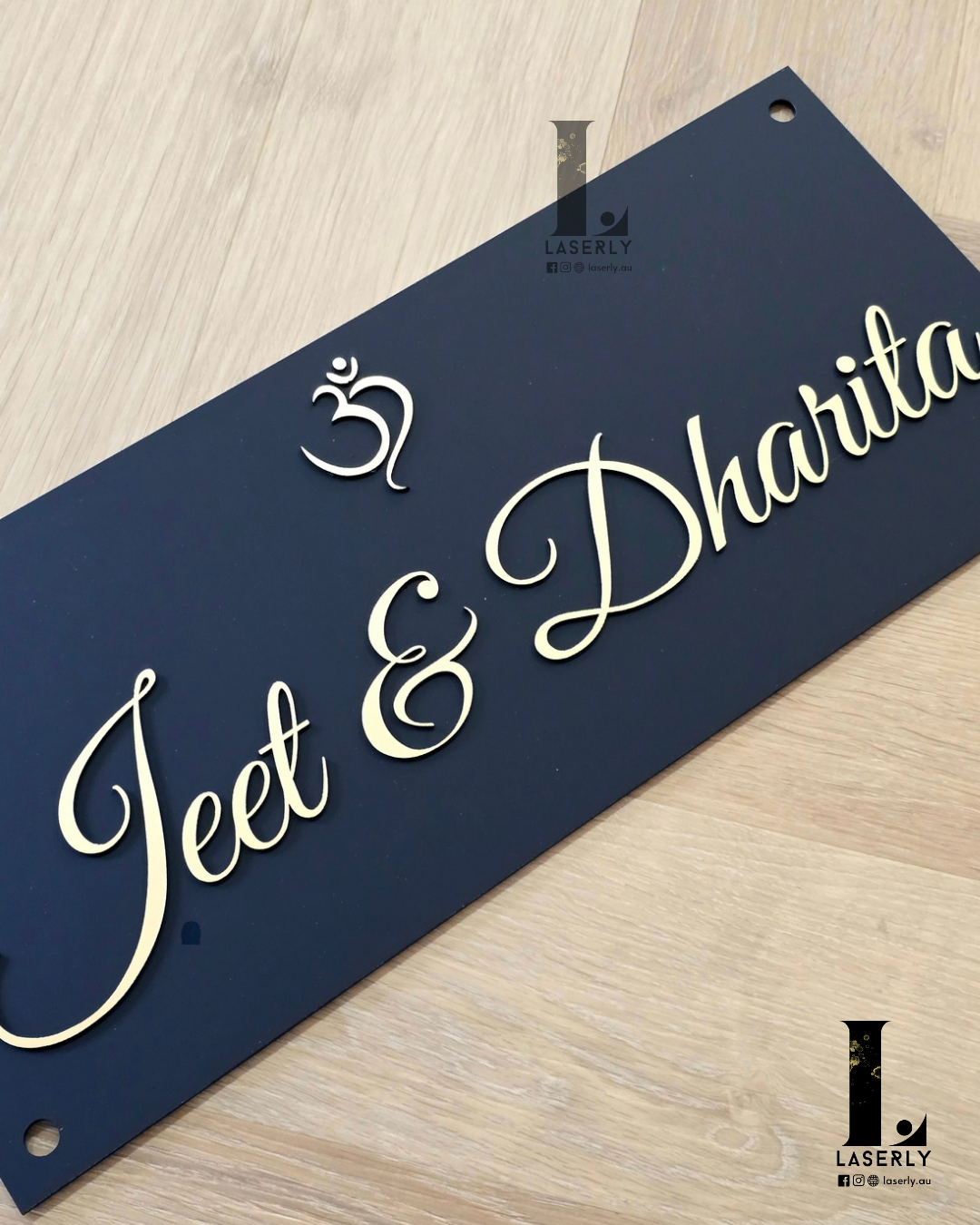 Stylish acrylic OM house number sign adding a touch of divinity to the exterior.