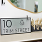 Contemporary minimal house number display with spiritual Ganesha motif.