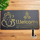 Elegant Ganesha Namaste house number sign in premium acrylic installed near entrance door.