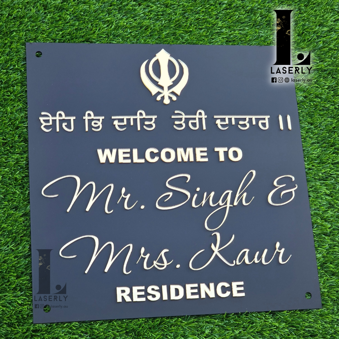 Close-up of Kandha house number sign in sleek Punjabi style.