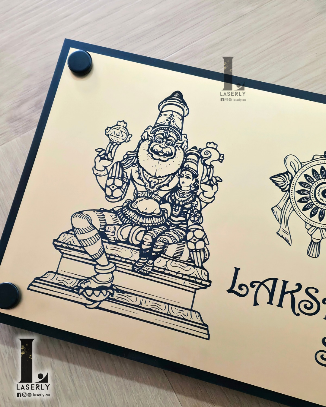 Lakshmi Narasimha themed house name board installed beside main entrance.