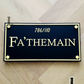 Minimalist acrylic house name sign mounted beside a modern Australian home entrance.