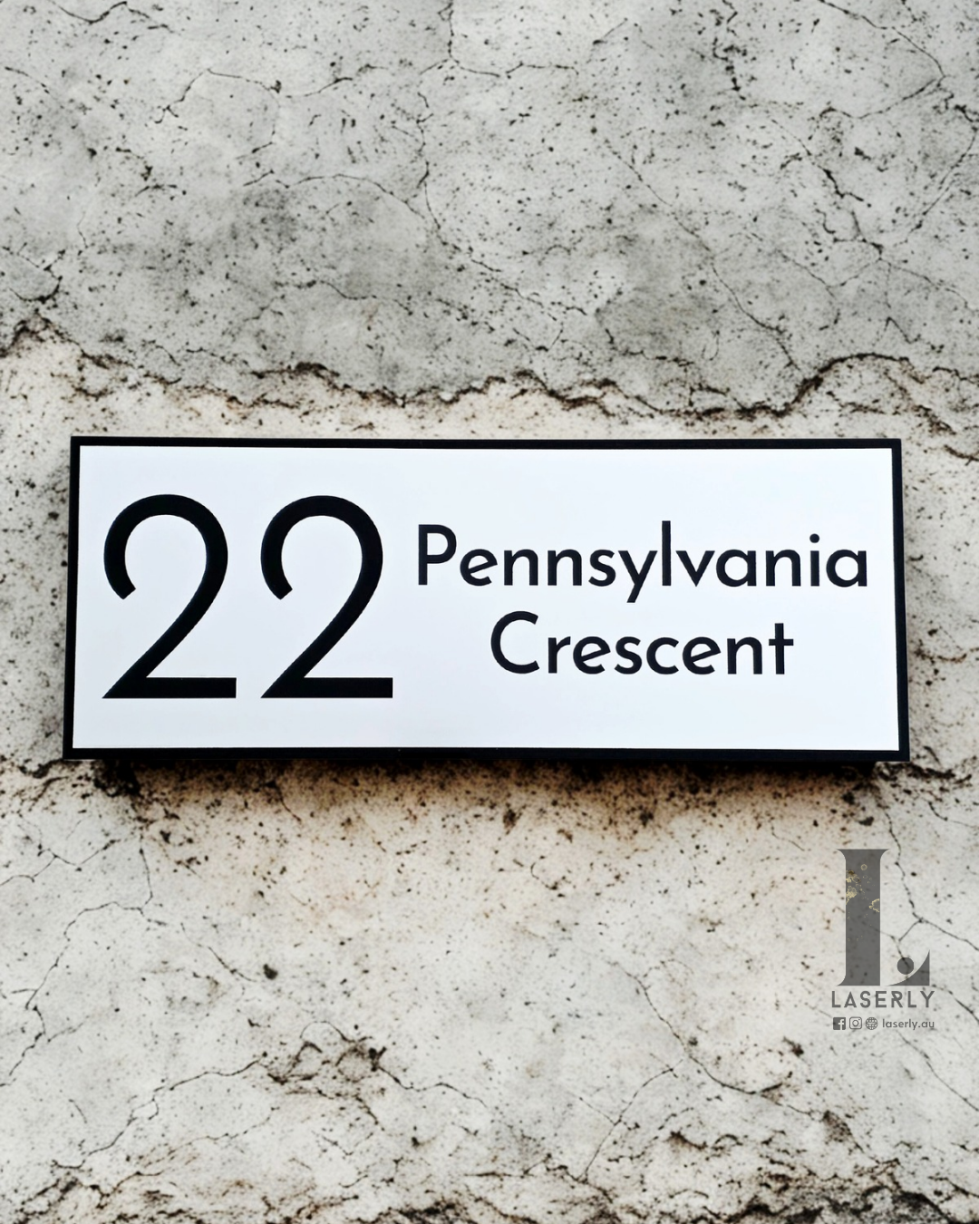 Modern minimalist house number sign in brushed steel look for contemporary homes.