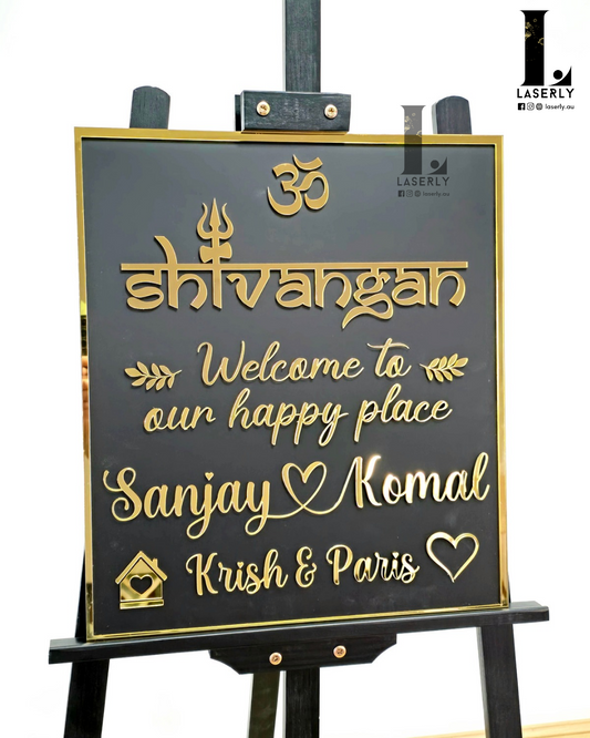 Modern Om Shiva house number sign mounted on exterior wall beside main entrance.