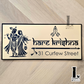 Radhe Krishna house number sign featuring elegant laser-cut design mounted beside the main entrance door.