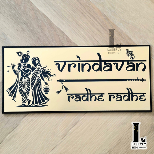 Radhe Krishna Vrindhavan house number sign featuring decorative script and spiritual motif, mounted beside the main entrance.